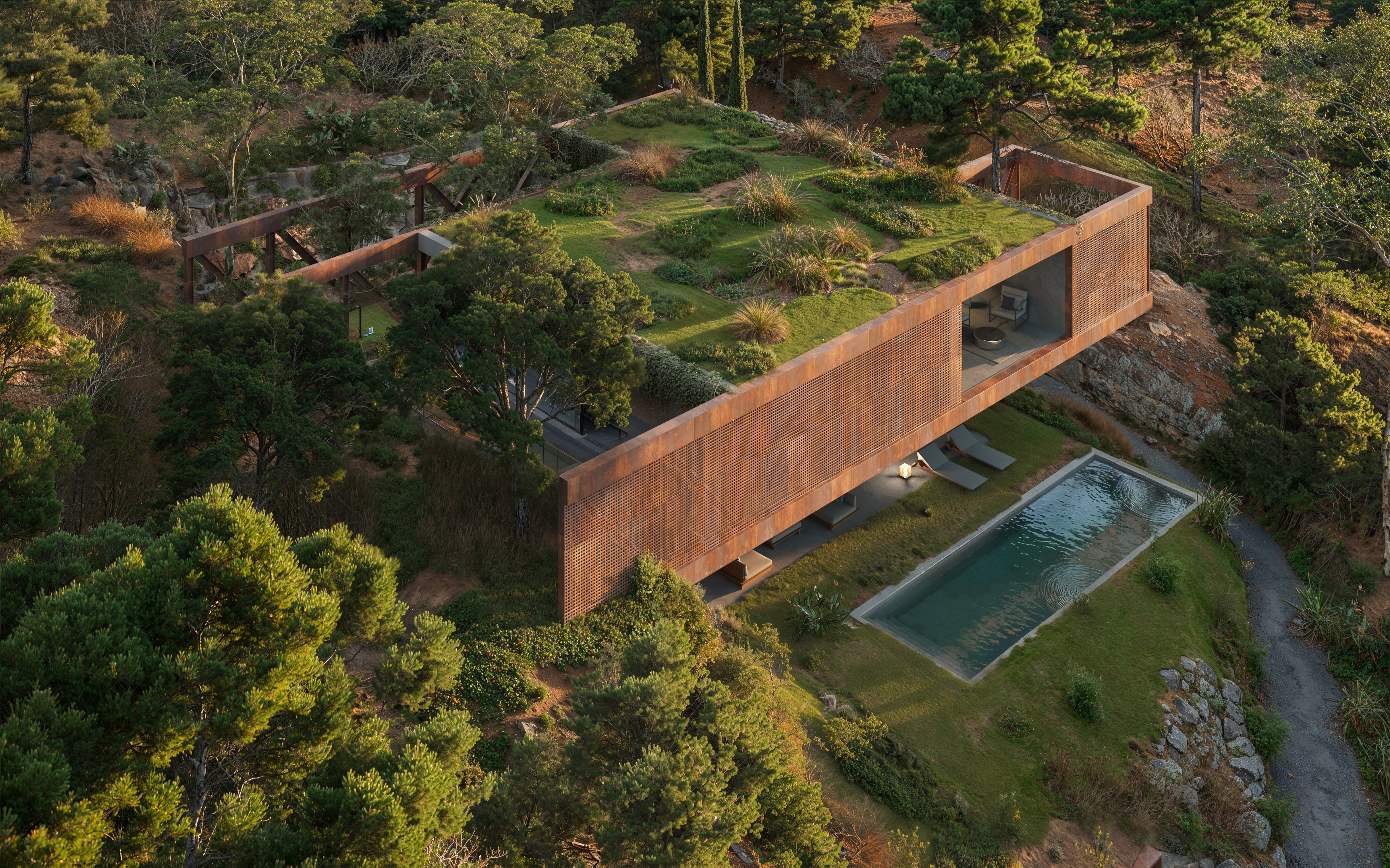 Villa El Cantal aerial view with green roof and pool