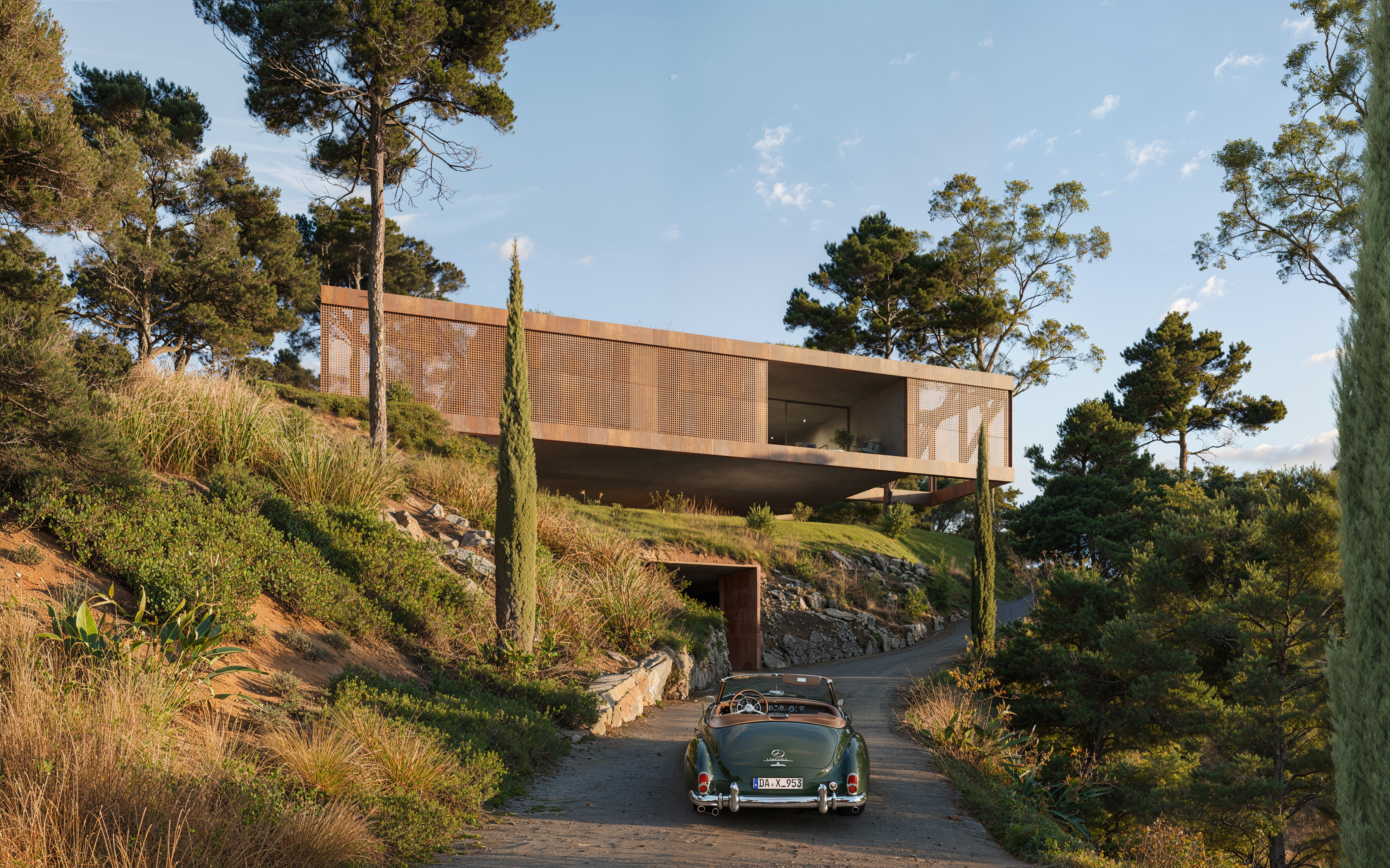 Villa El Cantal among Mediterranean pines